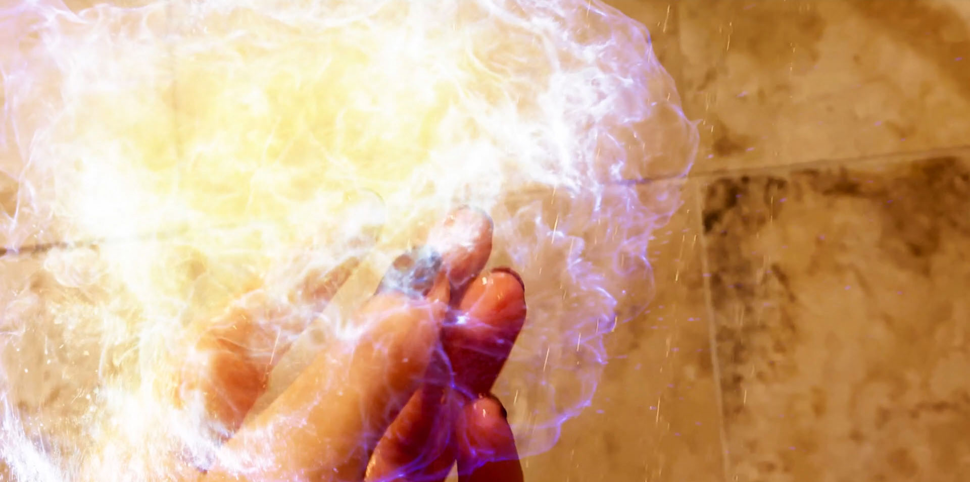 Lizet Benrey as Sandra Jones holding volatile glowing energy orb in Detective Jack Berdett