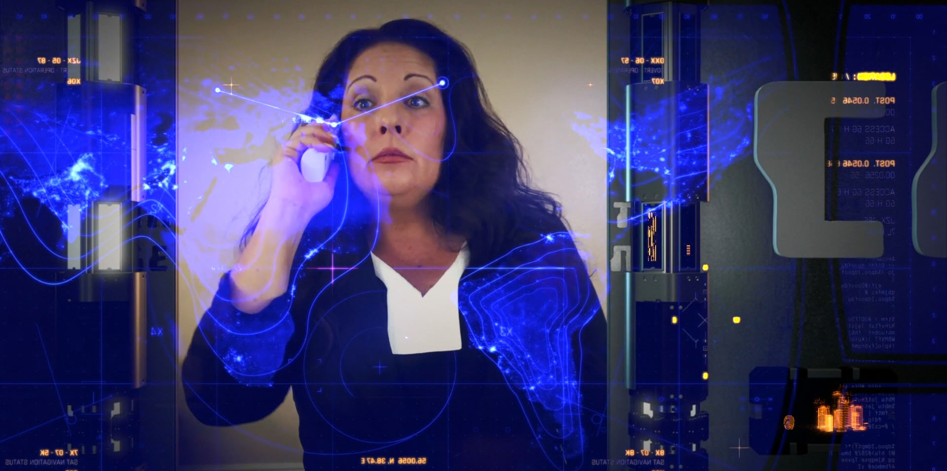 Wendy Fout as CIA Chief in holographic command center briefing Detective Jack Berdett